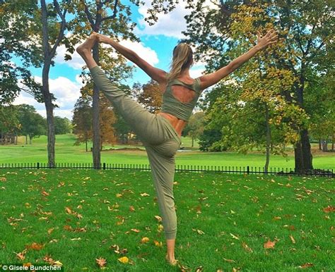 gisele bundchen shows off her impressive flexibility while performing yoga in the park daily
