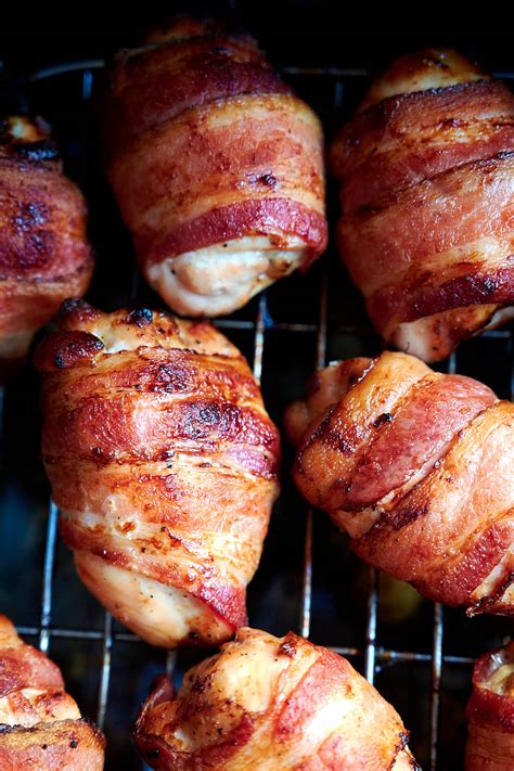 Our bacon wrapped chicken is sweet, smokey and crazy delish! Bacon Wrapped Chicken Thighs - i FOOD Blogger