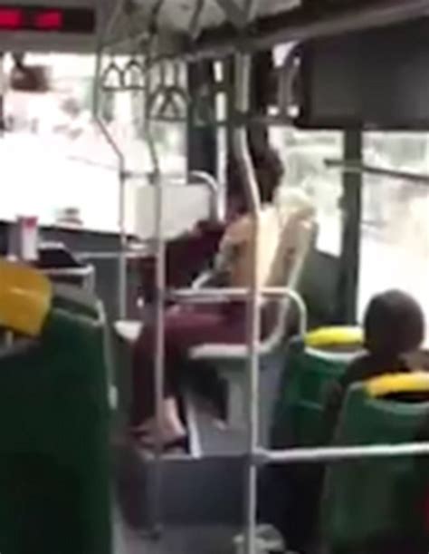 Bizarre Moment A Woman Strips Off And Sits On A Public Bus Topless In