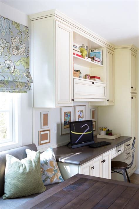 It can also be used as cupboard for storage of clothes and accessories. White Cottage Kitchen With Built-In Desk | HGTV
