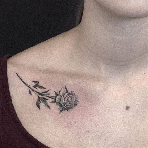 Fine Line Rose Tattoo On The Right Collarbone