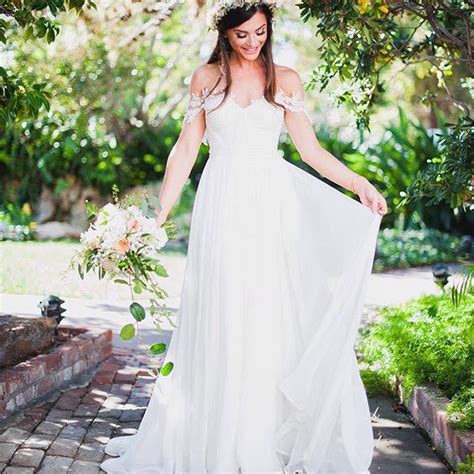 We've rounded up 30 simple gowns for every style and budget. Simple But Elegant Off-the-shoulder Beach Wedding Dresses ...