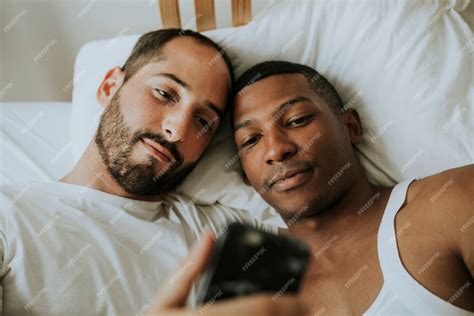 Premium Photo Couple Taking A Selfie In Bed