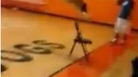 Man Tries To Jump Off A Chair To Dunk Finds Out Its A Terrible Idea