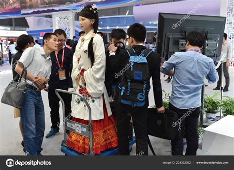 Chinas First Advanced Interactive Robot Jia Jia Interacts Visitors
