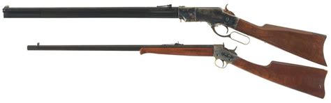Two Uberti Rifles A Uberti Model 1860 Iron Frame Henry Lever Action Rifle