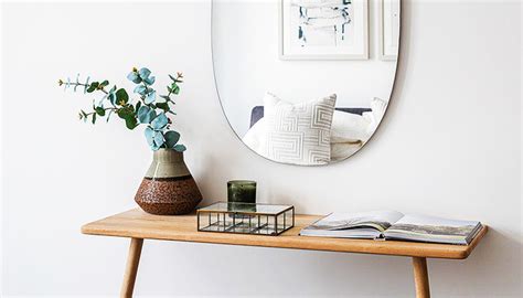 How High To Hang Mirror Over Sofa Table Baci Living Room
