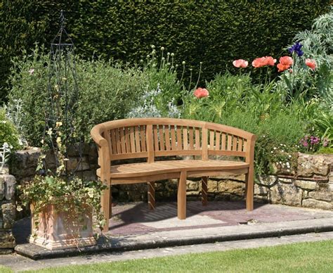 Modern garden bench | luxury designer garden furniture. Modern Teak Banana Garden Bench