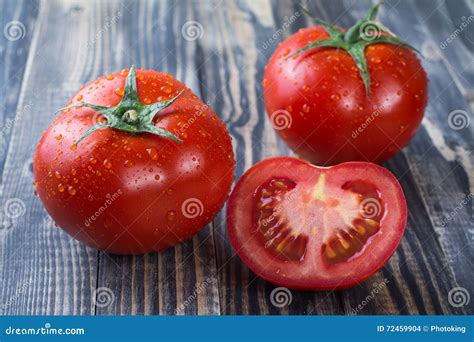 151 Tomato Drop Over Wooden Background Stock Photos Free And Royalty