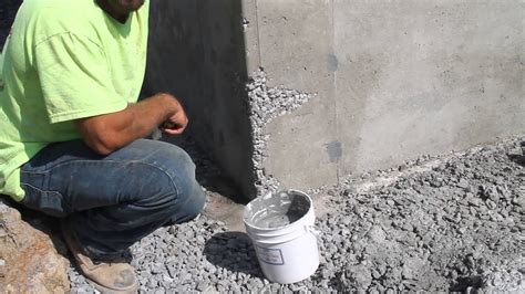 As the concrete dries, use either brooms or brushes to duplicate the pattern on the original wall. Repairing Holes In Concrete Walls | Zef Jam