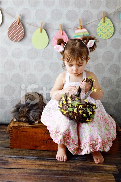 Here are a few fun easter gifts for kids you can tuck into a basket or present as individual gifts. Little Girl With Easter Basket and Bunny Stock Photos ...