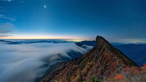 Fog Covered Horizon Mountain Under Blue Sky 4k Hd Nature Wallpapers