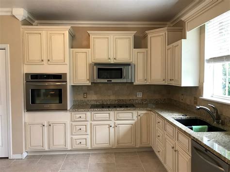 Pack a punch with freshly painted kitchen cabinets. Lighter and Brighter Kitchen Cabinets
