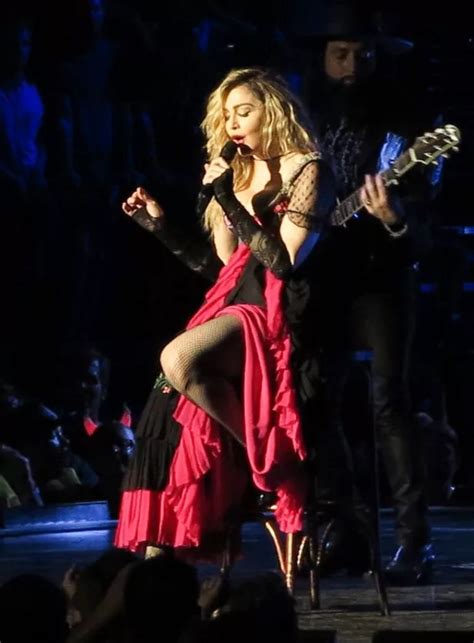 Madonna Shocks As She Pulls Down A Female Fans Top To Reveal Her Bare Breast On Stage Irish