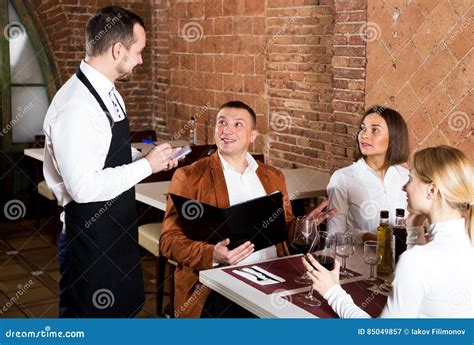 Man Waiter Receiving Order From Guests Stock Image Image Of Receiving