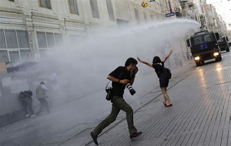 Huru Hara Akhir Zaman Riot Police Use A Water Cannon To Disperse Demonstrators During A