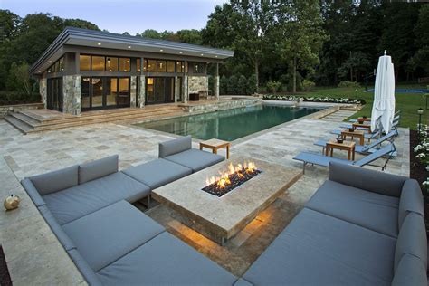 Modern Fire Pit Outdoor Lounge And Pool House Outdoor Spaces Pool House Designs Fire Pit