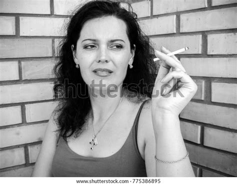 Mature Beautiful Brunette Woman Smoking Cigarette Stock Photo Edit Now