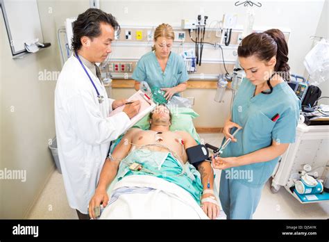 Asian Male Nurse Patient Chart Hi Res Stock Photography And Images Alamy