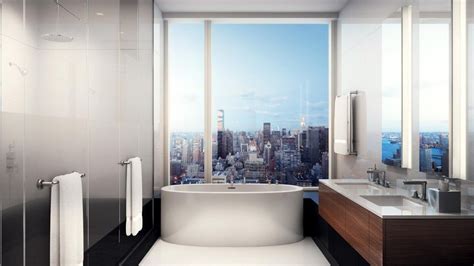 If you're trying to fit a bathroom or powder room into a (really really) tight space, take a look at this list of sinks and vanities that can squeeze into the smallest of spaces. NYC VIEWS | Condo bathroom, Contemporary bathtubs ...