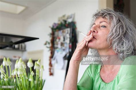 Mature Woman Smoking Photos And Premium High Res Pictures Getty Images