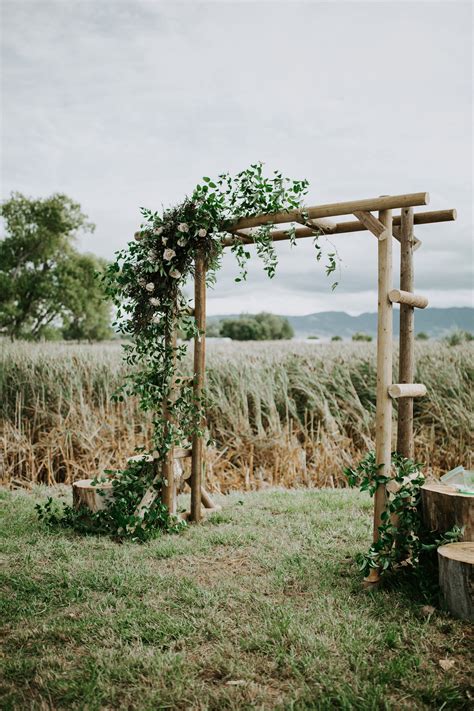 A Cowboy Wedding In September — Whirly Girl Flowers Wedding Arbor