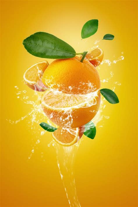 Water Splashing On Fresh Sliced Oranges And Orange Fruit On Orange