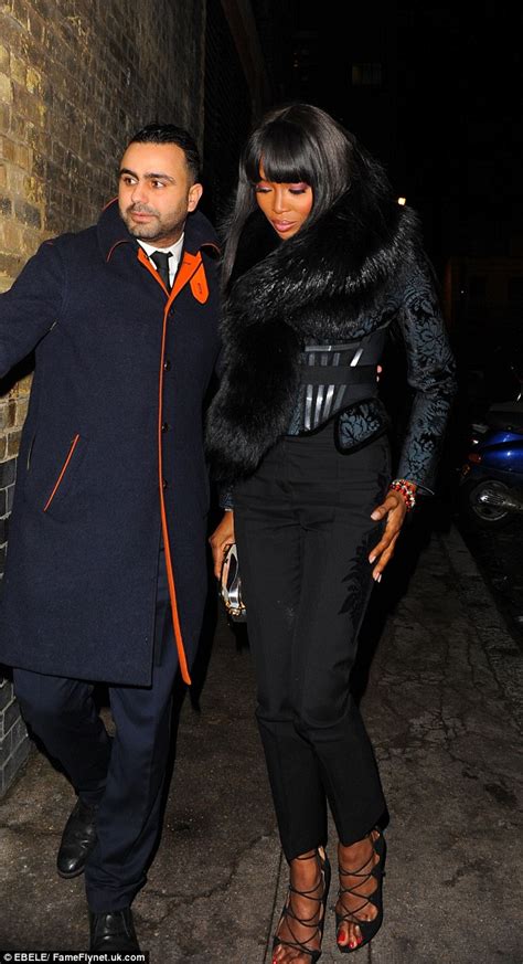 naomi campbell flaunts a hint of cleavage at marc jacobs beauty event daily mail online