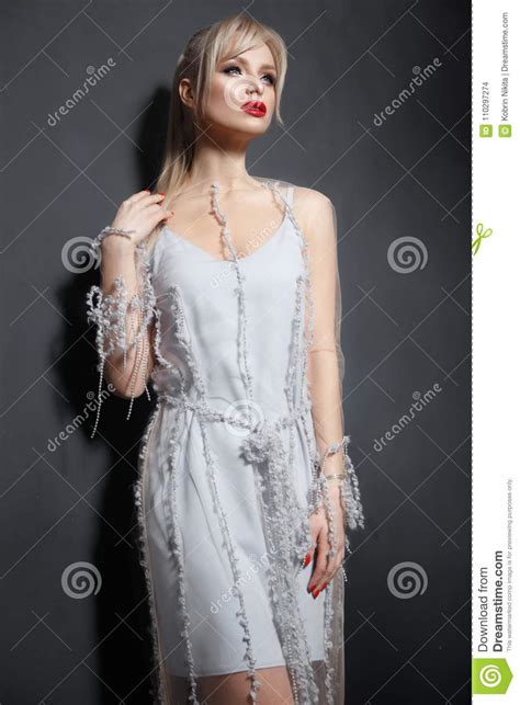 Beautiful Girl In Designer Fashionable Transparent Clothes