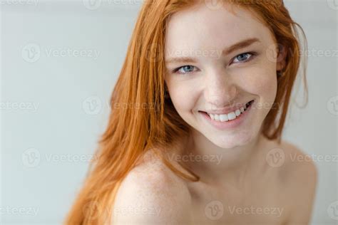 Smiling Redhead Woman Looking At Camera 1221415 Stock Photo At Vecteezy