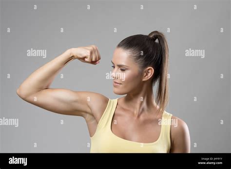 Woman Flexing Muscle Arm Hi Res Stock Photography And Images Alamy
