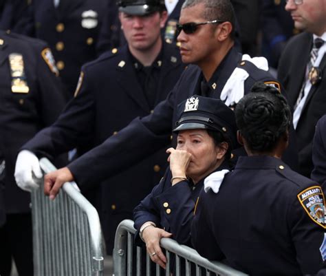 Thousands Mourn Slain Nypd Officer At Funeral