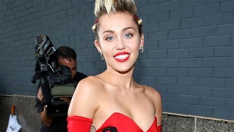 Miley Cyrus Flaunts Raunchy Images