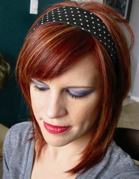 This red bob gets a boost from bold streaks of blonde that are placed on the bottom layers throughout her hair and bangs. Cute Short Red Hairstyles for Women | Short Hairstyles 2019