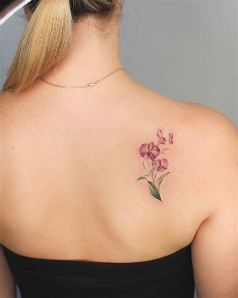 Orchids Tattoo On The Right Shoulder Blade Shoulder Blade Tattoo