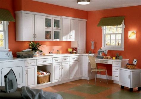If you want to use orange in your kitchen but aren't loving the bright orange hues, try looking for light orange colors that have some yellow or brown in them — they will have a mellow vibe without looking too pastel. Wall color ideas kitchen orange walls white kitchen cabinets plant | Orange kitchen walls ...