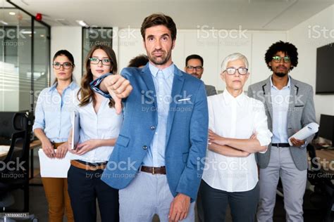Group Of Unsuccessful Business People And Badly Managed Company Leads