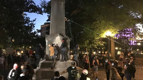 Protesters Deface Confederate Monument Damage Buildings In Downtown