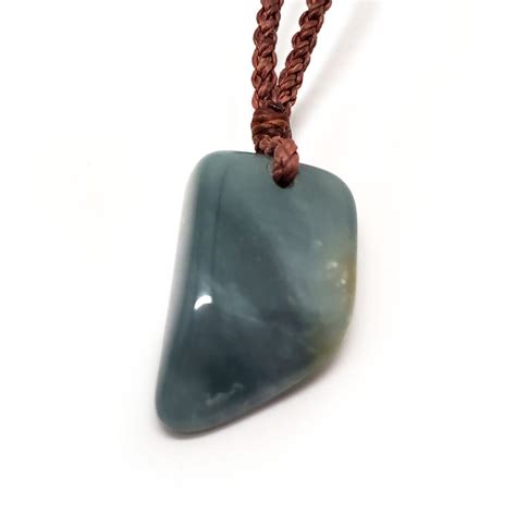 Jade Drilled Pendant With Braided Rope The Fossil Cartel