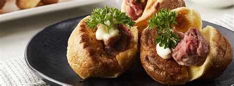 Transfer wrapped beef to a cutting board. Mini Yorkshire Pudding with Beef Tenderloin Hors d'oeuvres - Sweet Potato Chronicles