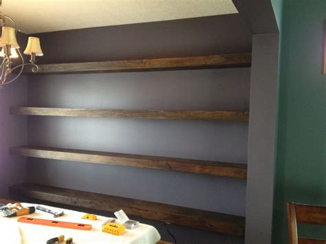 Floating wall shelves can be used in many ways; Wall-to-wall Floating Shelves in Dining Room - Shanty 2 Chic