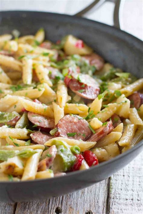 Tender bites of chicken, smoked sausage and bell peppers in. Skillet Pasta with Sausage - Taste and Tell