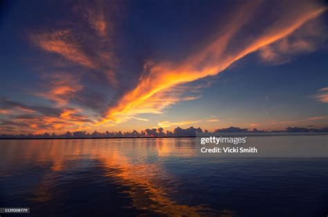 Vibrant Colored Sunrise Over The Ocean High Res Stock Photo Getty Images