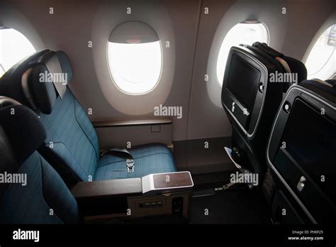 Empty Aircraft Premium Economy Class Seats And Windows Stock Photo Alamy