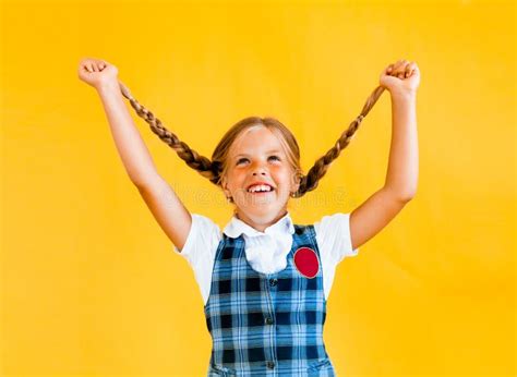 Little Schoolgirl With A Happy Smile Little Schoolgirl In School