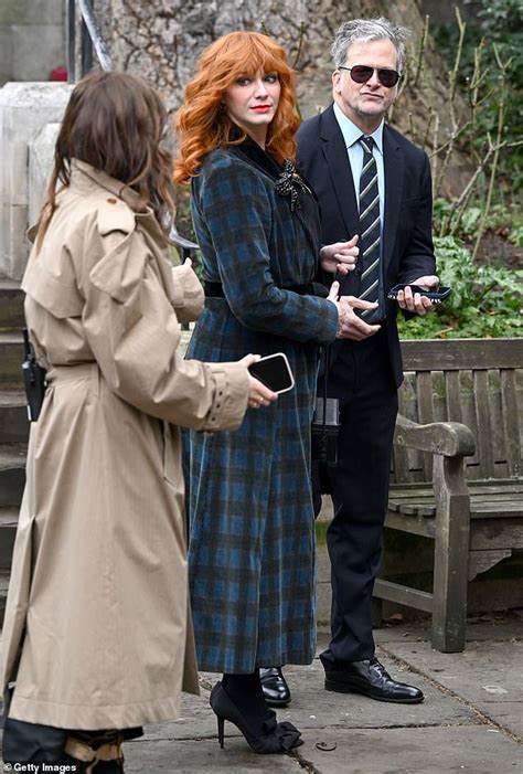 Mad Men S Christina Hendricks Pays Tribute To Dame Vivienne Westwood In Plaid Coat As She