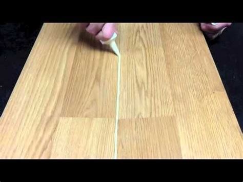 Fill any noticeable holes with wood filler as needed. Filling Seam on Hardwoods | Wood repair, Wood floor care ...