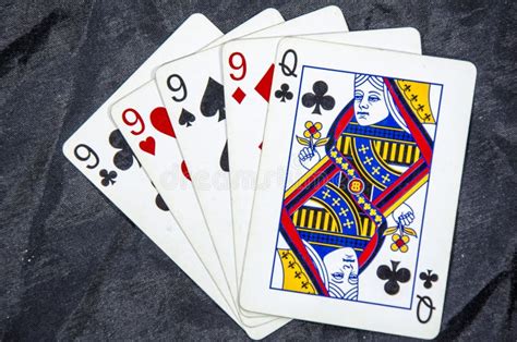 Five Playing Cards Four Of A Kind Nine S And A Queen Stock Image