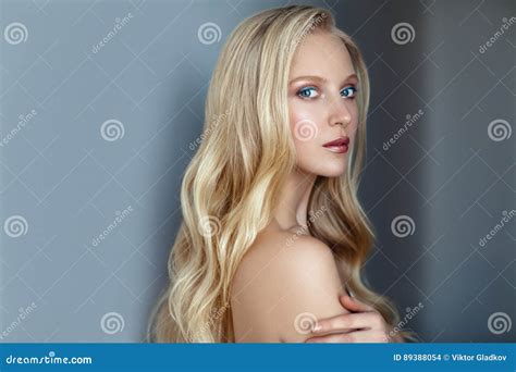 Beauty Portrait Of Nordic Natural Blonde Woman On Dark Background Stock