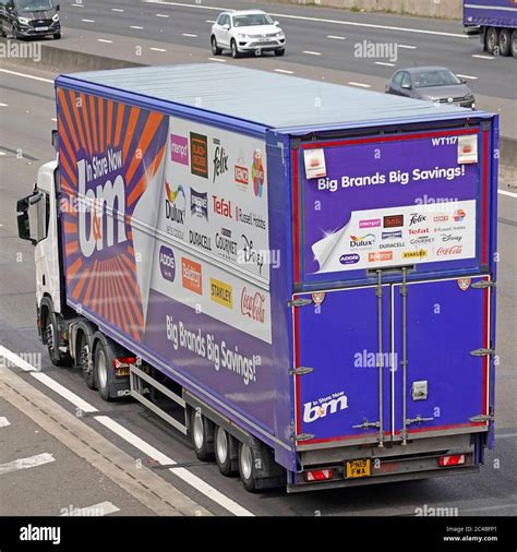 advertising on back and side of bandm retail business lorry truck trailer promoting brand labels as